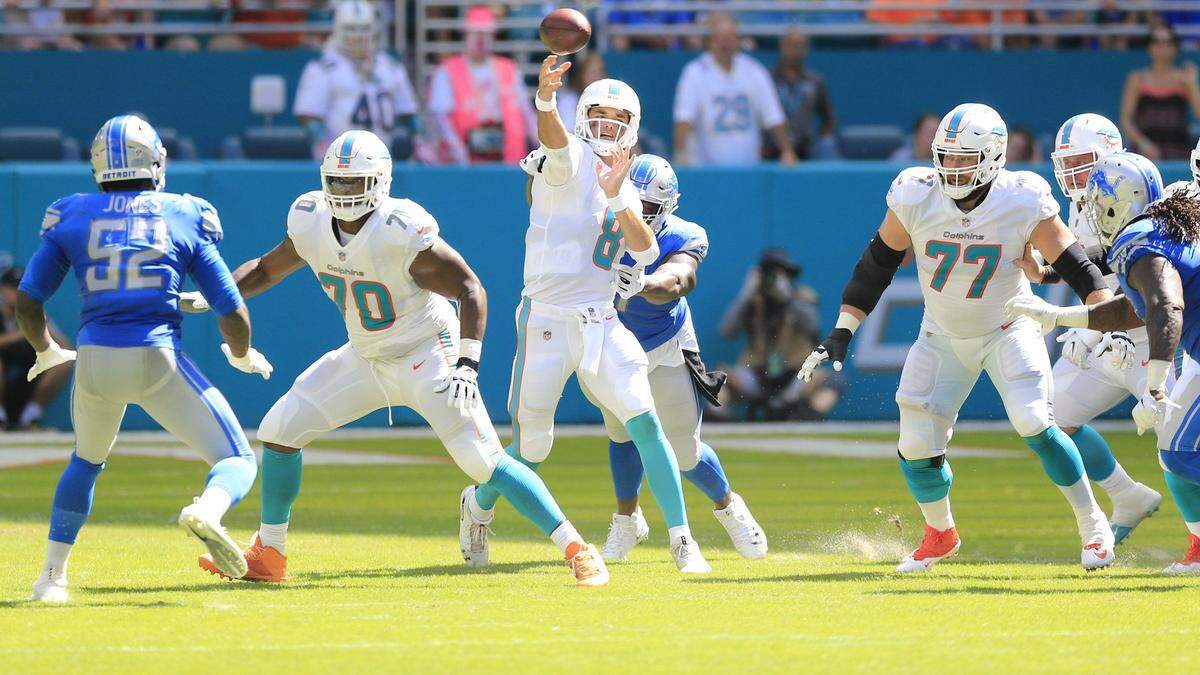 Miami Dolphins quarterback Brock Osweiler (8) sets up to pass in the second quarter as the Miami Dolphins host the Detroit Lions at Hard Rock Stadium in Miami Gardens on Sunday, October 21, 2018.