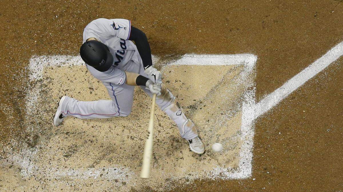 Miami Marlins’ Brian Anderson hits a grand slam during the third inning of a baseball game against the Milwaukee Brewers Wednesday, June 5, 2019, in Milwaukee. (AP Photo/Morry Gash)
