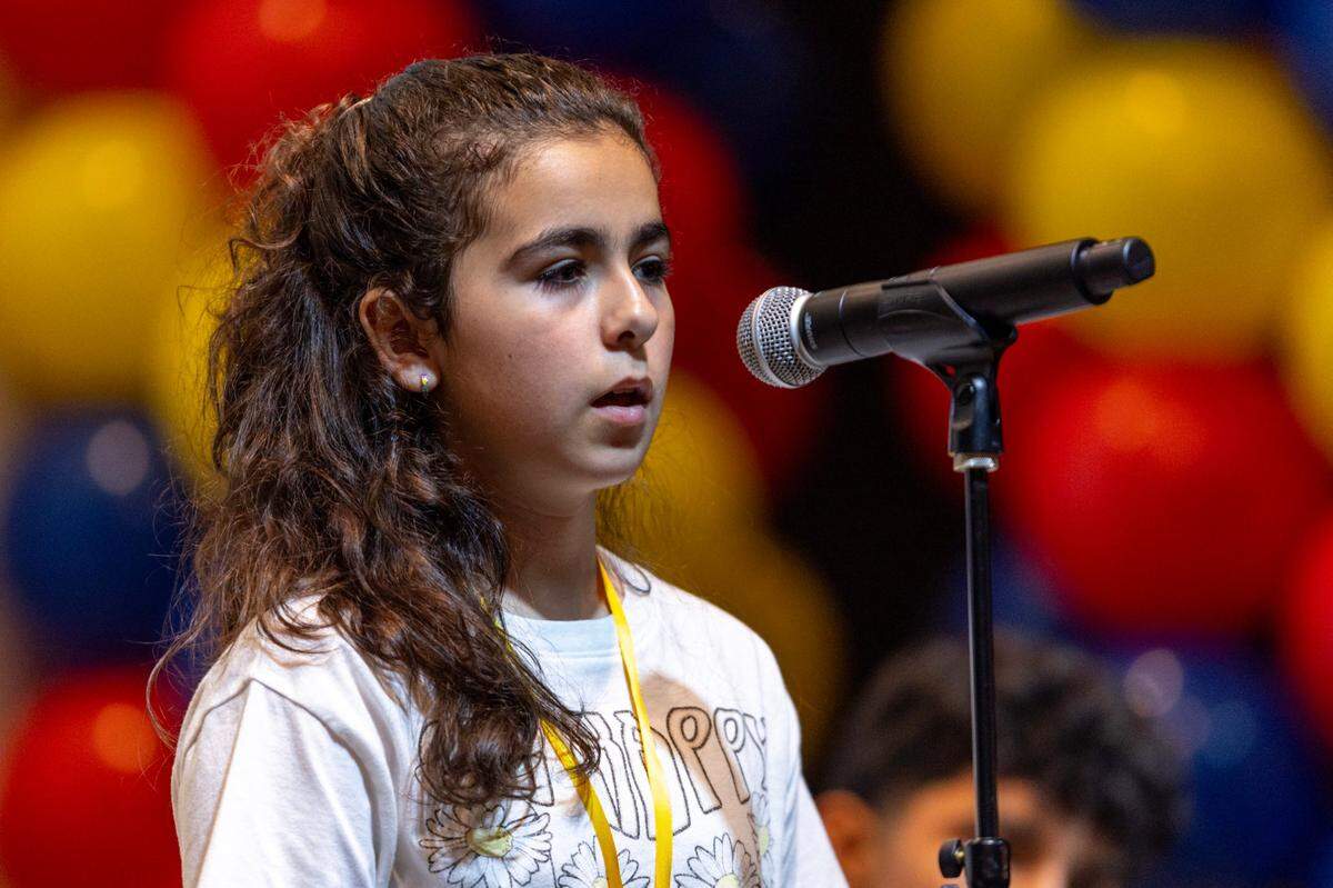 Fifth grader Jasmine Perez from Bayview Elementary School spells a word during the 5th round of the Miami Herald Broward County Spelling Bee at NSU Art Museum in Fort Lauderdale, Florida on Thursday, March 7, 2024.