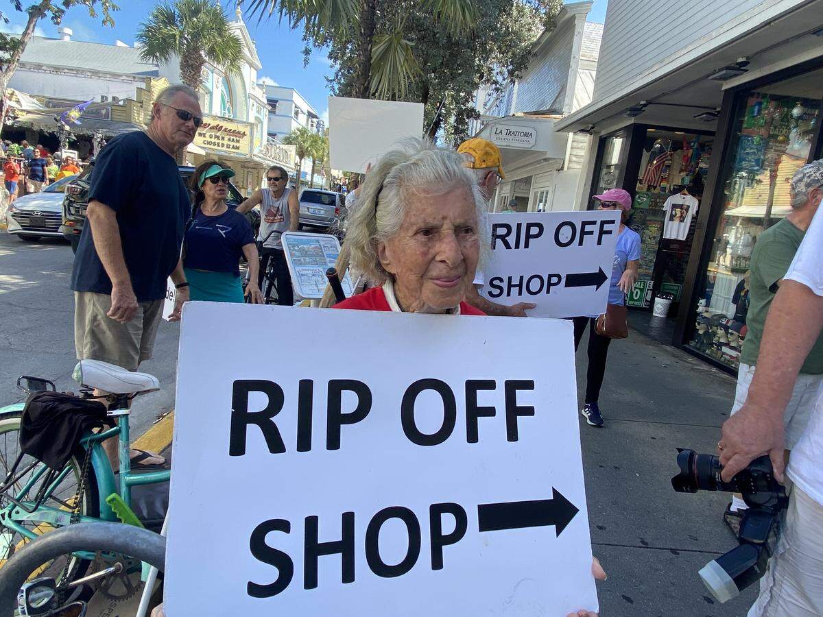 Shirlee Ezmirly, 92, of Key West, believes the cosmetic cream shop at 518 Duval St. isn’t doing business fairly. She protests the shop on Feb. 18, 2020.