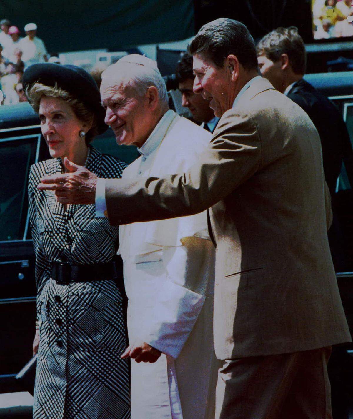 President Ronald Reagan and first lady Nancy Reagan greet Pope John Paul II at Miami International Airport in 1987.