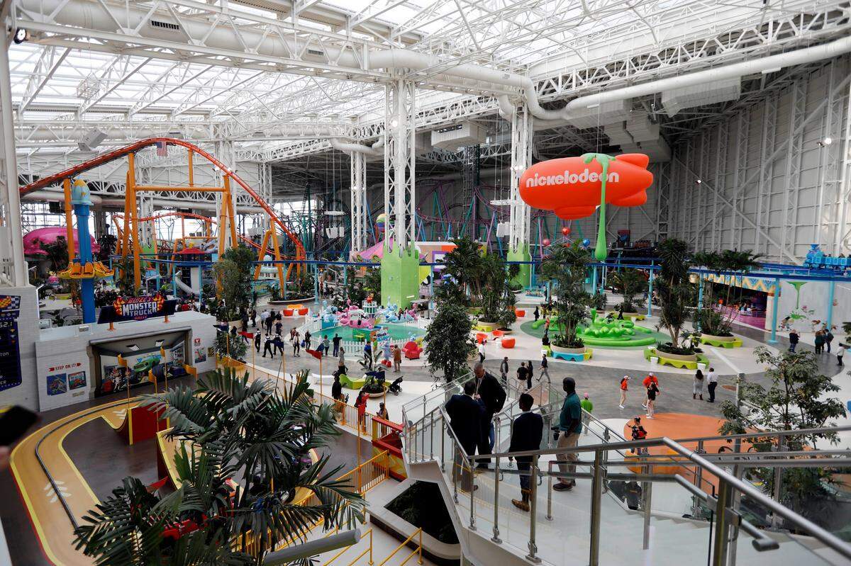 Visitors to the American Dream mega entertainment and shopping complex in East Rutherford, N.J., use the Nickelodeon Universe theme park, Friday, Oct. 25, 2019. After endless fits and starts and billions of dollars spent, American Dream is officially opening its doors to the public as the second largest mall in the country, and third largest in North America.