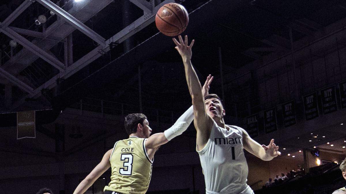 Miami Hurricanes guard Dejan Vasiljevic (1) gets inside in the first half as the Hurricanes host Georgia Tech at the Watsco Center in Coral Gables on Saturday, February 23, 2019.