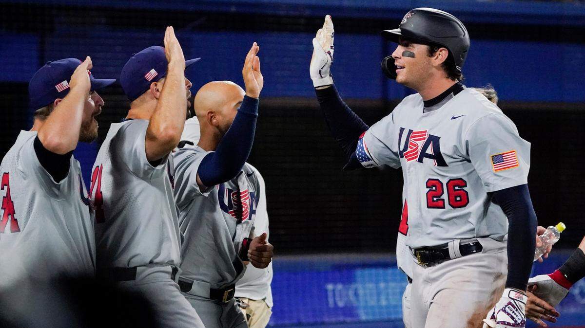 United States’ Triston Casas (26) celebrates his home run with teammates during the fifth inning of a baseball game against Japan at the 2020 Summer Olympics, Monday, Aug. 2, 2021, in Yokohama, Japan. (AP Photo/Sue Ogrocki)