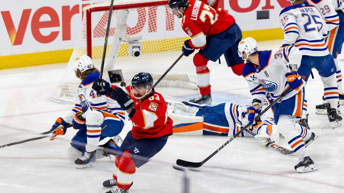 Florida Panthers center Brad Marchand (63) reacts after scoring a goal against the Edmonton Oilers during the first period of Game 3 in the NHL Stanley Cup Final series at Amerant Bank Arena on Monday, June 9, 2025, in Sunrise, Fla.