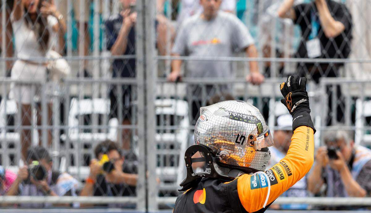 McLaren drivers Lando Norris of Britain waves to fans after placing first in his Sprint race on the second day of the Formula One Miami Grand Prix at the Miami International Autodrome on Saturday, May 3, 2025, in Miami Gardens, Fla.