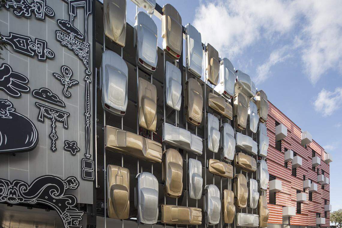 Three distinct facades on the north frontage of the Museum Garage in the Miami Design District are, from left, "Serious Play" by artist Nicolas Buffe, "Urban Jam" by architects Clavel Arquitectos of Spain, and "Barricades" by K/R Architect of New York and Miami.