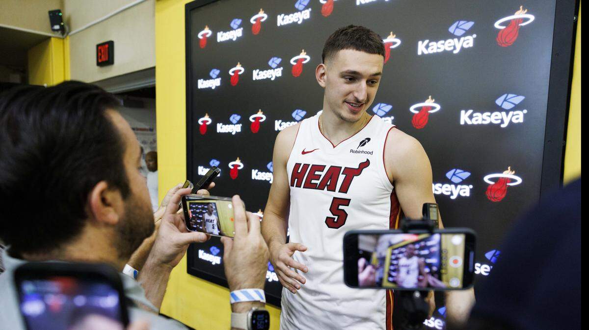 Nikola Jovic (5) talks to reporters during the Miami Heat Media Day on Monday, Sept. 29, 2025, at the Kaseya Center in Miami.