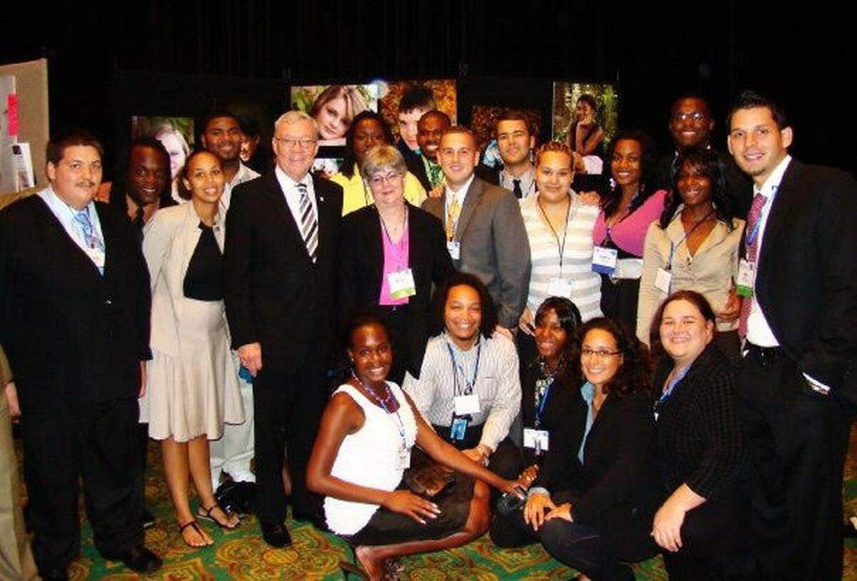 George Sheldon, in striped tie, appeared at an event for Florida Youth Shine, an organization that helps former foster children develop leadership traits.