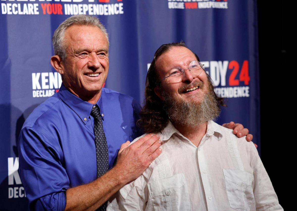 Chuck Muldoon, at right, poses for a photo with candidate Robert F. Kennedy Jr. who hit the campaign trail to celebrate his launch of an independent run for President of the United States of America at the Adrienne Arsht Center for the Performing Arts in Miami on Thursday, October 12, 2023.