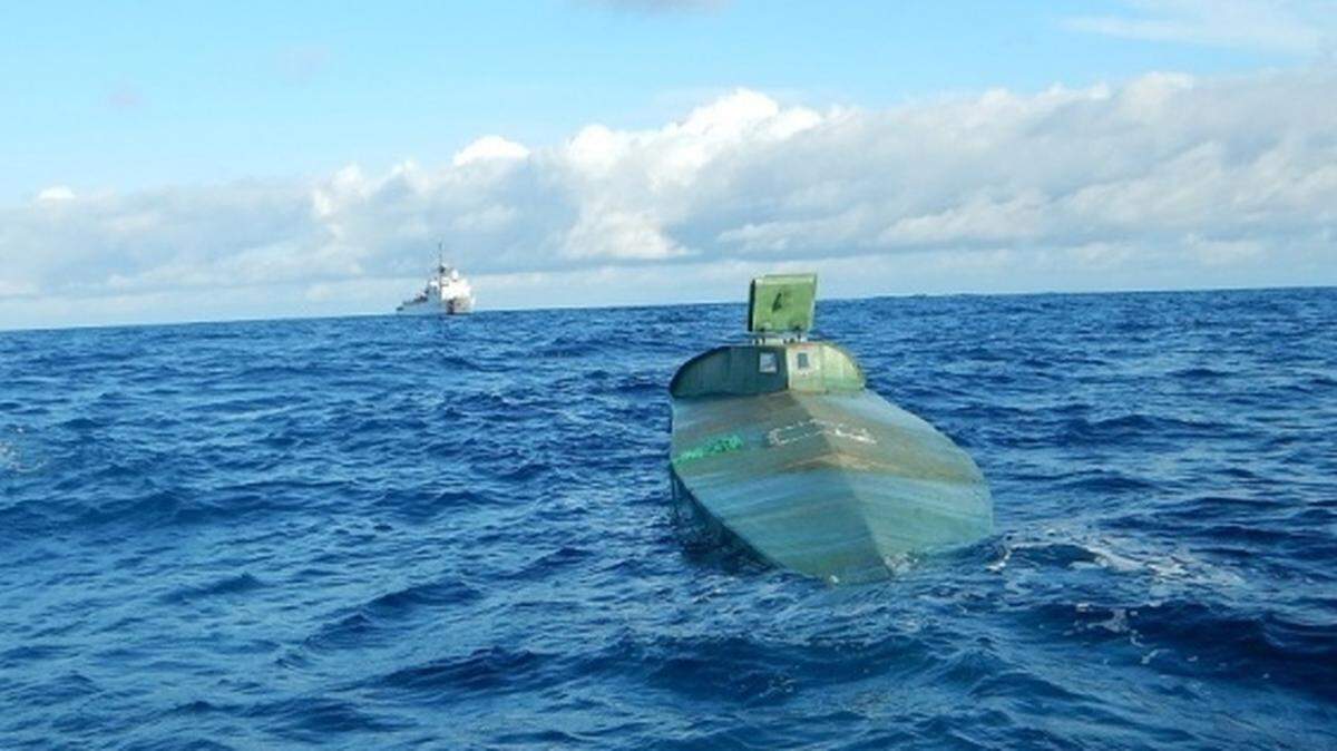 A low-profile, suspected cocaine smuggling vessel drifts in international waters of the eastern Pacific Ocean after being intercepted by the crew of the U.S. Coast Guard Cutter Thetis on Nov. 21, 2019.