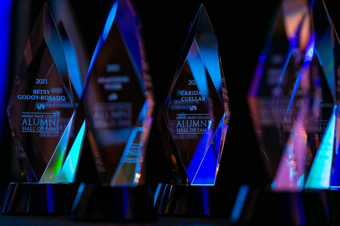 Awards are on display before the start of Miami Dade College’s 2021 Alumni Hall of Fame Ceremony at the school’s Wolfson Campus in downtown Miami on Wednesday, June 9, 2021. MDC recognized ten alumni on the frontlines of the coronavirus pandemic in a special heroes edition of the annual Alumni Hall of Fame induction ceremony.
