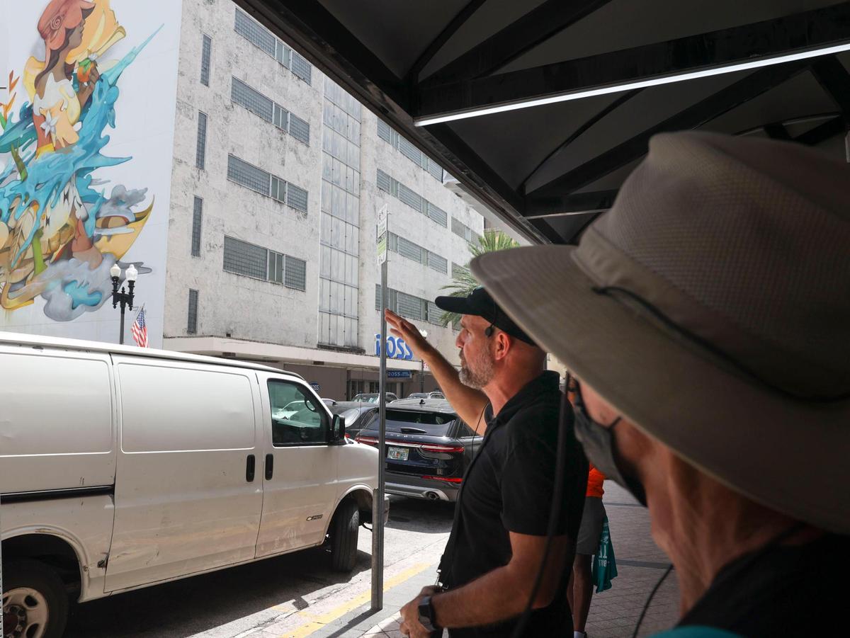 A mural is pointed out to the Miami Dolphins rookie class during a historic walking tour of Downtown Miami with local community groups on Wednesday, June 15, 2022, beginning with tour leaders at the History Miami Museum.