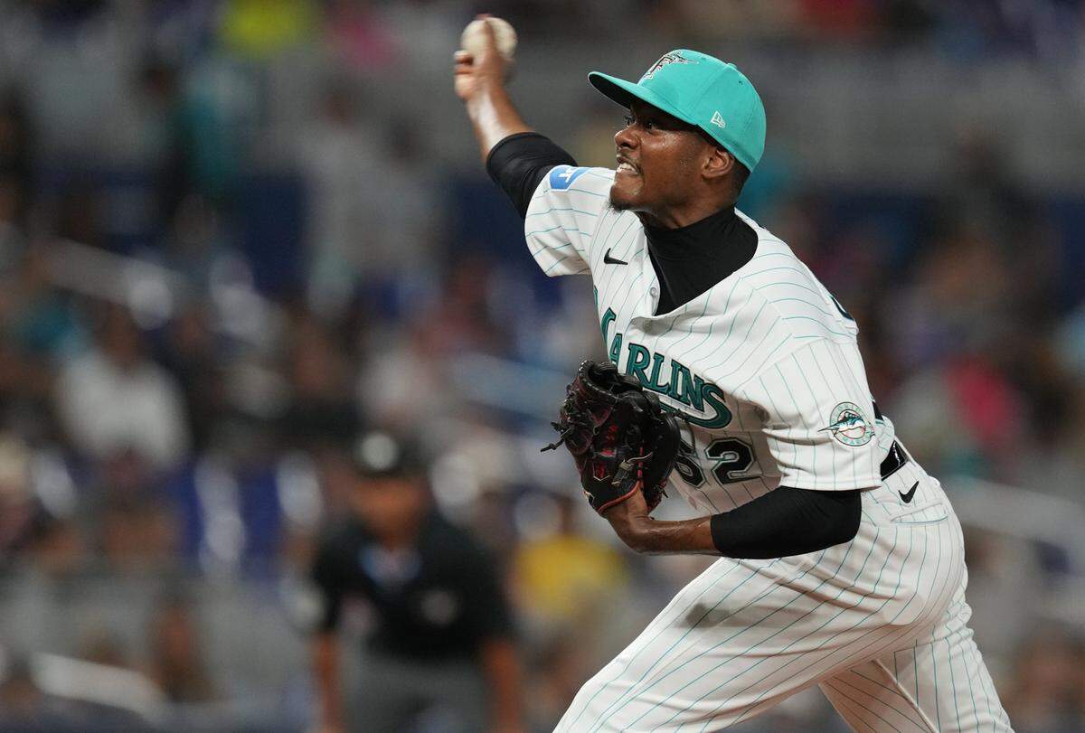Miami Marlins relief pitcher George Soriano (62) pitches against the Colorado Rockies in the fourth inning at loanDepot Park.
