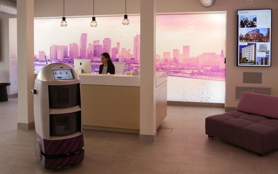 YotelPad Miami has introduced its robotic concierge that will roam through its property giving directions, serving snacks and beverages, using the elevator, and performing bellhop duties at their Yotelpad Miami location.  The robot has several different greetings and verbal responses and features a touch screen with various facial expressions.  The device was available for review inside the YotelPad Miami sales gallery in downtown Miami, on Monday, Aug. 27, 2018.