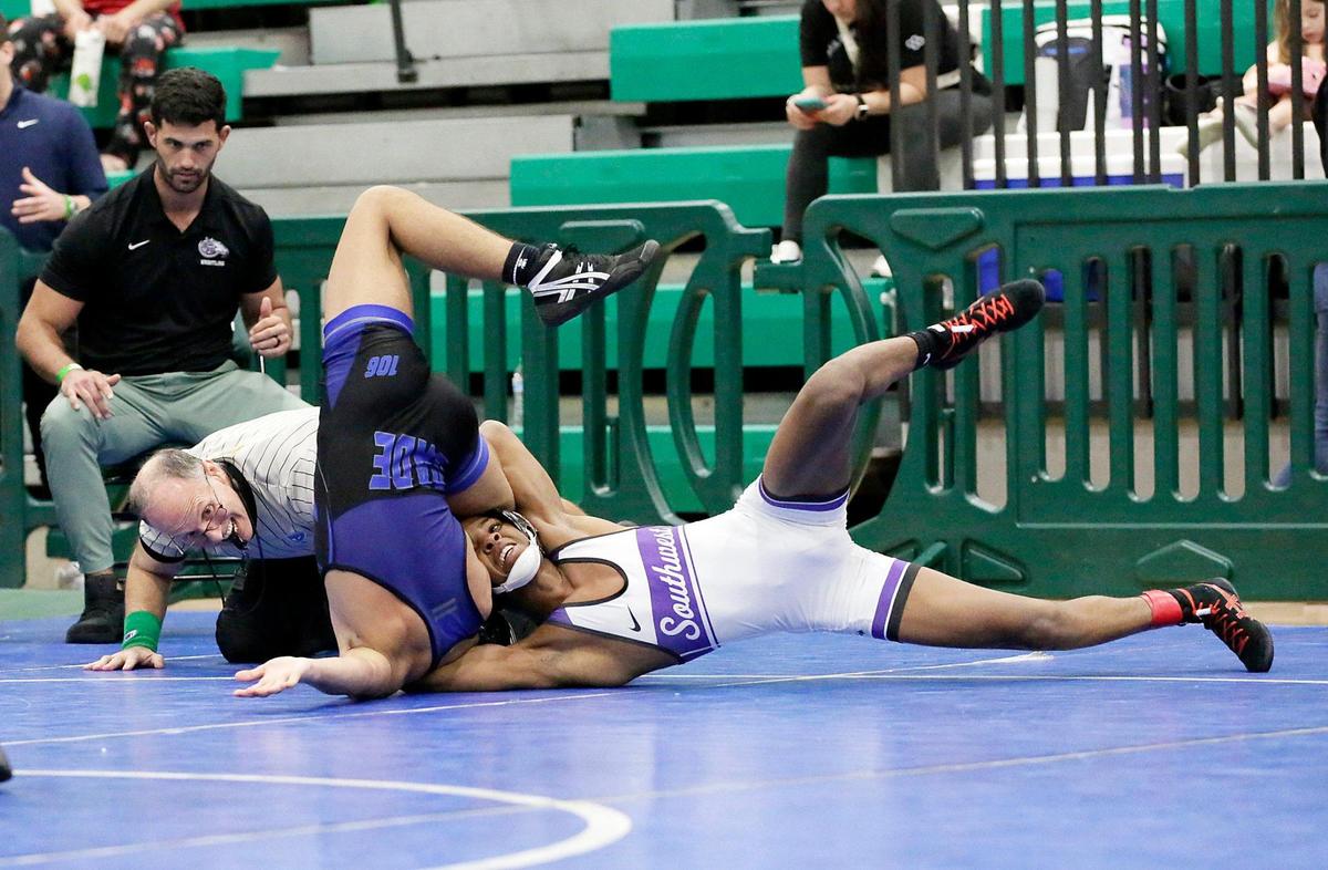 South Dade Jose Callava wrestles Southwest Lazaro Soto (on the right) during 2025 GMAC 106 lb weight wrestling final match on Saturday, February 8, 2025 at Miami Central HS in Miami. Andrew Uloza / for Miami Herald