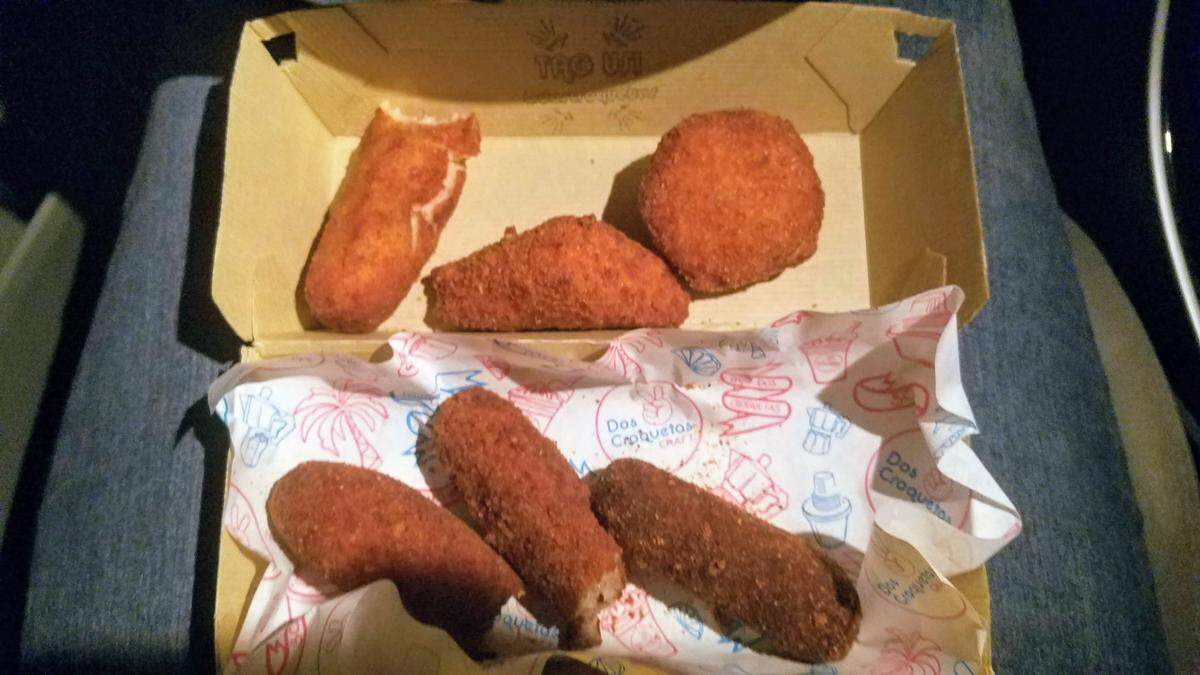 You hardly know where to start with these crispy, perfect croquetas.
