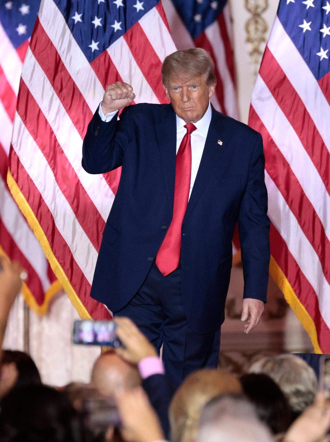 Former President Donald Trump pumps his fist as he reacts to the crowd after Trump announces his bid for the US Presidency from his Mar-a-Lago club in Palm Beach, Florida on Tuesday, November 15, 2022.