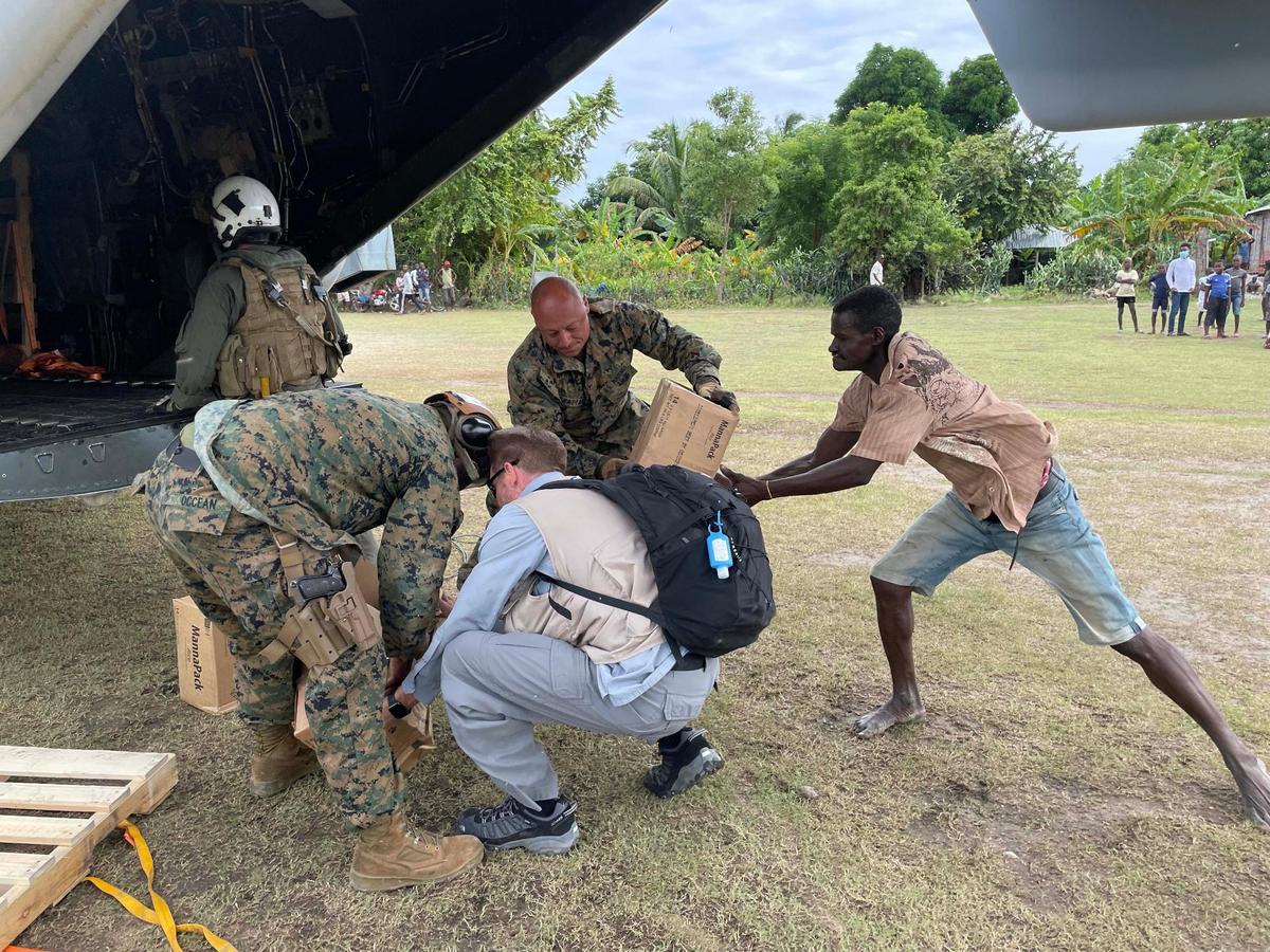 U.S. military aircraft drops off aid on Friday, Aug. 21, 2021, to Les Anglais, a remote community on Haiti’s southern peninsula that was devastated by the Aug. 14 earthquake.