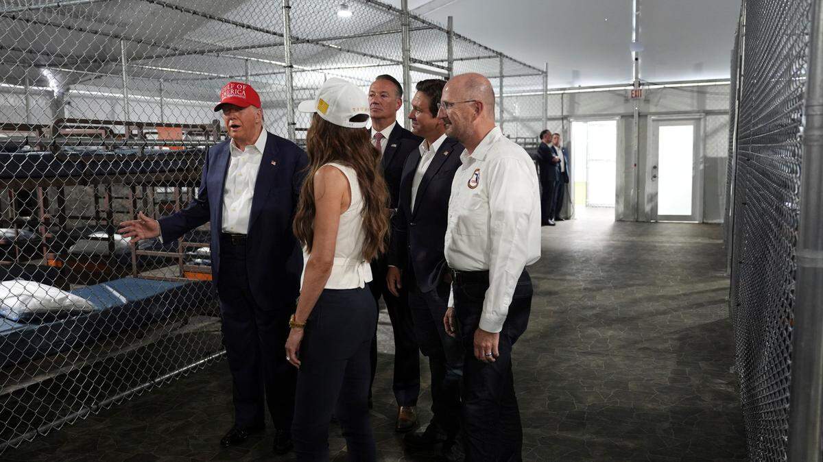 President Donald Trump, Florida Gov. Ron DeSantis, Homeland Security Secretary Kristi Noem and others tour Alligator Alcatraz, a new migrant detention facility in the Everglades.