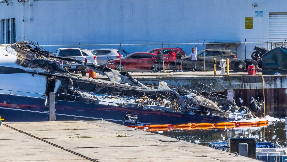 Scene of a destroyed boat that caught on fire around 3:30 a.m. in the area off Northwest North River Drive near the Miami Marine Center marina and Jones Boat Yard, on Friday March 07, 2025.