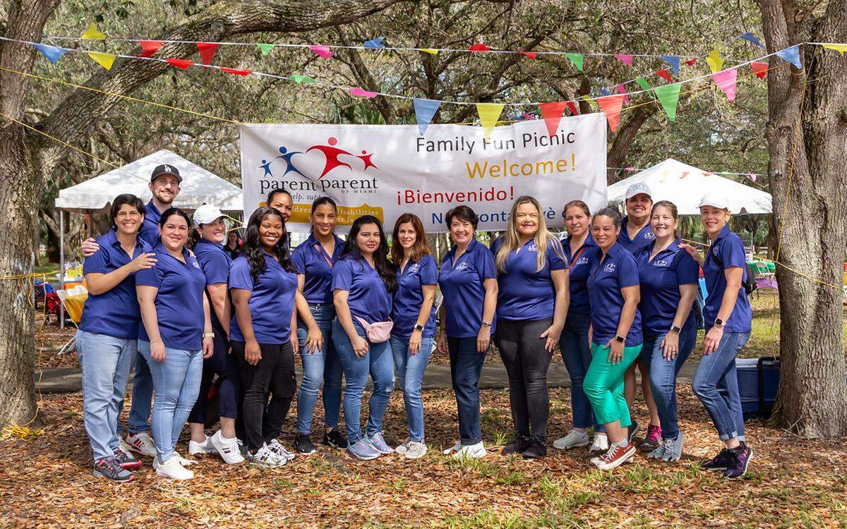 Parent to Parent of Miami staff and board members congregate at the organization’s Family Engagement Picnic at Kendall Indian Hammocks Park, Feb. 24, 2024.