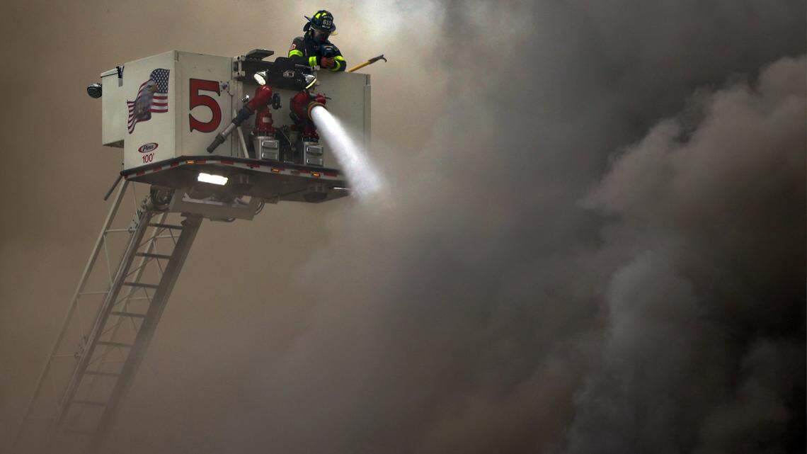 Police take custody of man who they say shot another, ignited apartment fire in Miami