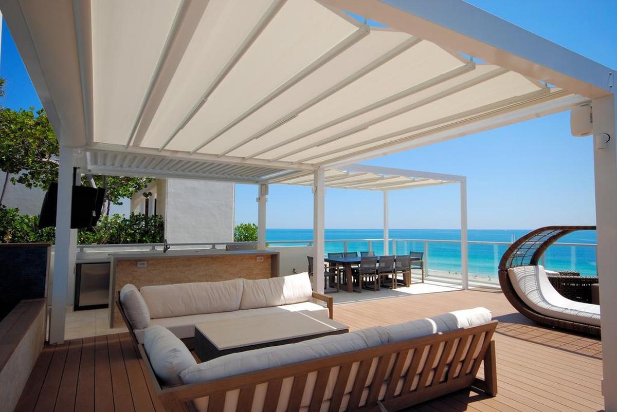 Custom-made retractable canopies at a Miami Beach penthouse.