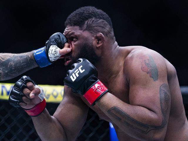 Curtis Blaydes of the United States and Josh Hokit of the United States fight in their heavyweight bout at UFC 327 at the Kaseya Center on Saturday, April 11, 2026, in downtown Miami, Fla.