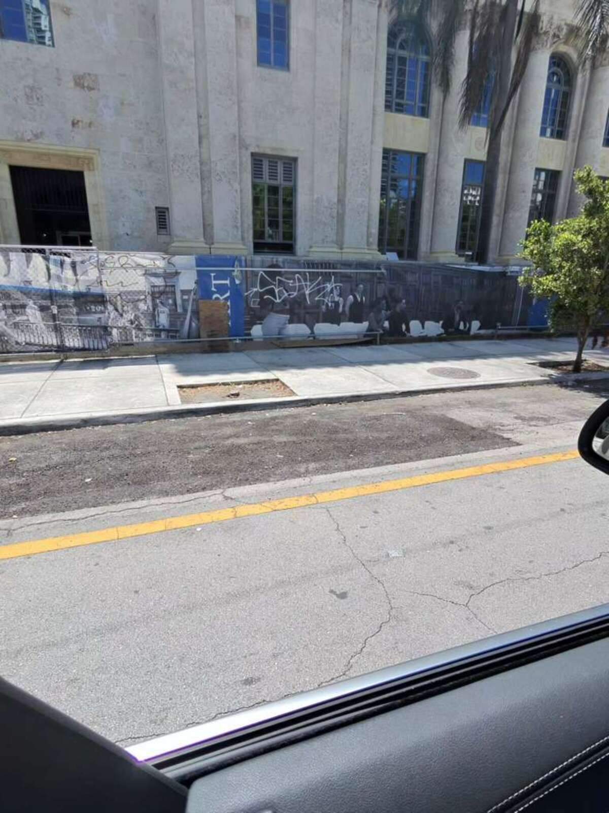 A photo provided by Miami Commissioner Ralph Rosado’s office showing graffiti on construction site fencing.