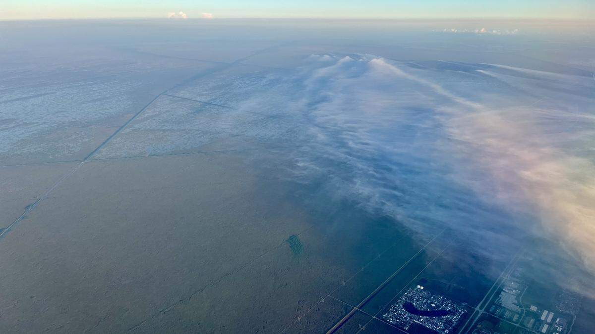 Steve Davis, the Everglades Foundation’s chief scientist, photographed a wildfire burning northwest of Weston that was sending smoke across much of Southeast Florida. 
