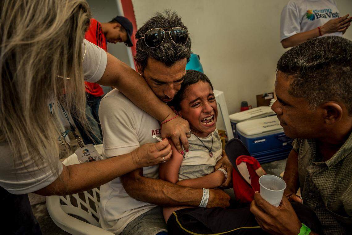 A Venezuelan child receives a vaccination in Boa Vista, Brazil, April 4, 2018. International health officials expressed alarm about a rebound in measles, once nearly eradicated in many regions. Reported cases surged by nearly a third worldwide.