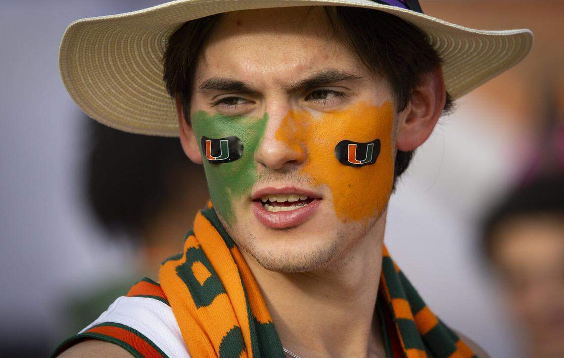 A Miami Hurricanes fan attends the Allstate Championship Tailgate inside the stadium before the College Football Playoff National Championship Game at Hard Rock Stadium on Monday, Jan. 19, 2026 in Miami Gardens, Fla.
