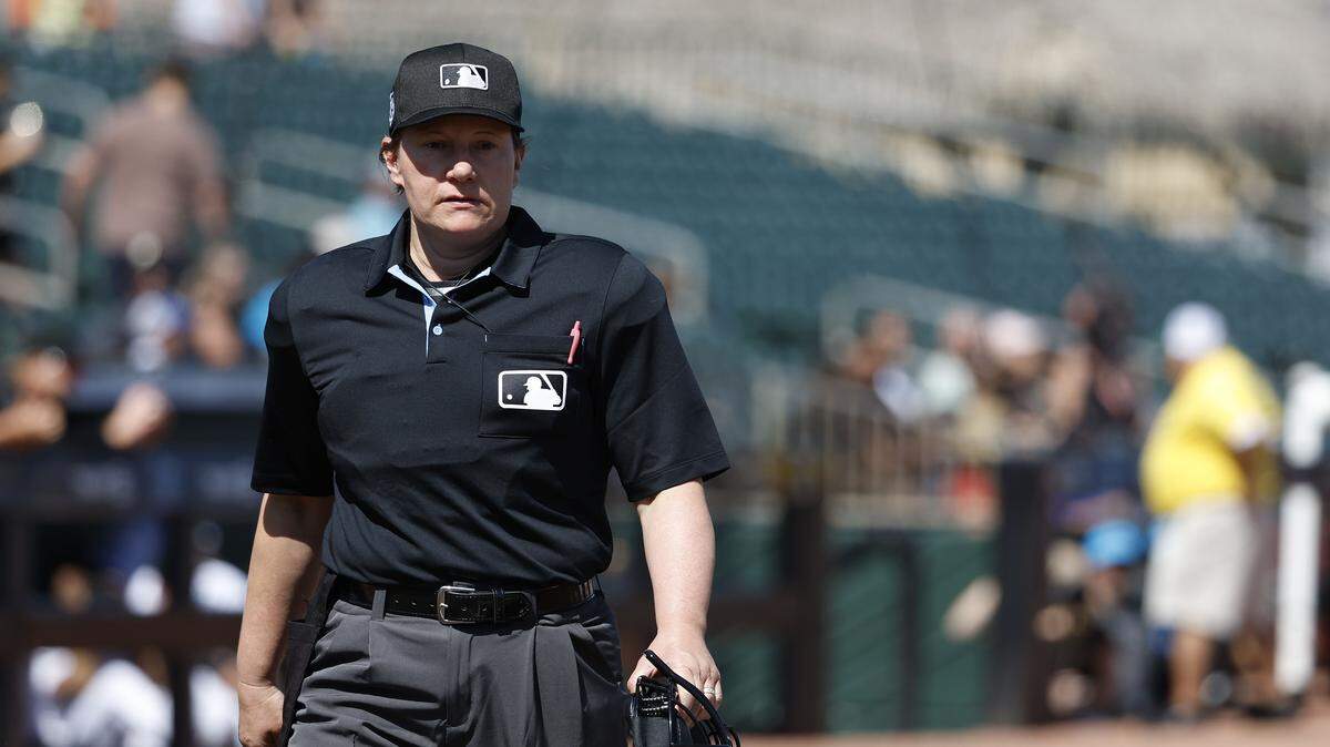 Feb 25, 2024; Jupiter, Florida, USA; Umpire Jen Pawol walks to the plate prior to the game between the Washington Nationals and the Miami Marlins at Roger Dean Chevrolet Stadium. Mandatory Credit: Rhona Wise-USA TODAY Sports
