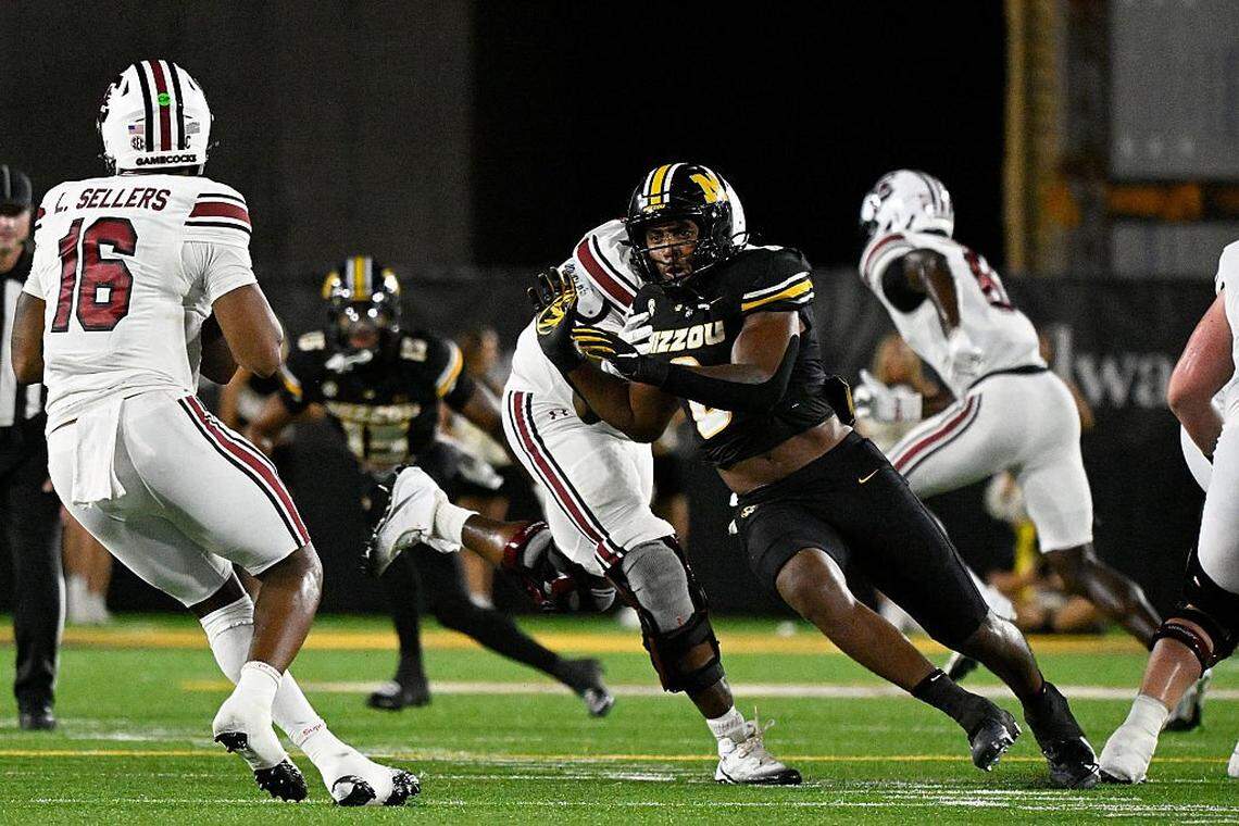 COLUMBIA, MISSOURI - SEPTEMBER 20: Damon Wilson II #8 of the Missouri Tigers rushes LaNorris Sellers #16 of the South Carolina Gamecocks at Faurot Field at Memorial Stadium on September 20, 2025 in Columbia, Missouri. (Photo by Jeff Le/Getty Images)