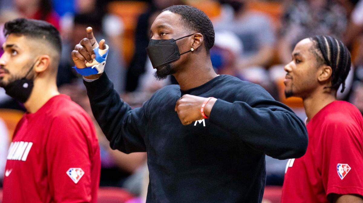 Miami Heat center Bam Adebayo reacts from the sideline while injured on the bench during Wednesday’s loss to Cleveland.