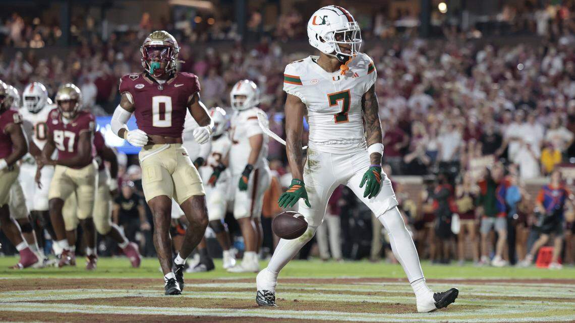 Miami Hurricanes wide receiver CJ Daniels (7) scores in the first half of the NCAA game against the Florida State Seminoles at Doak Campbell Stadium in Tallahassee, Florida, on Saturday, October 4, 2025.