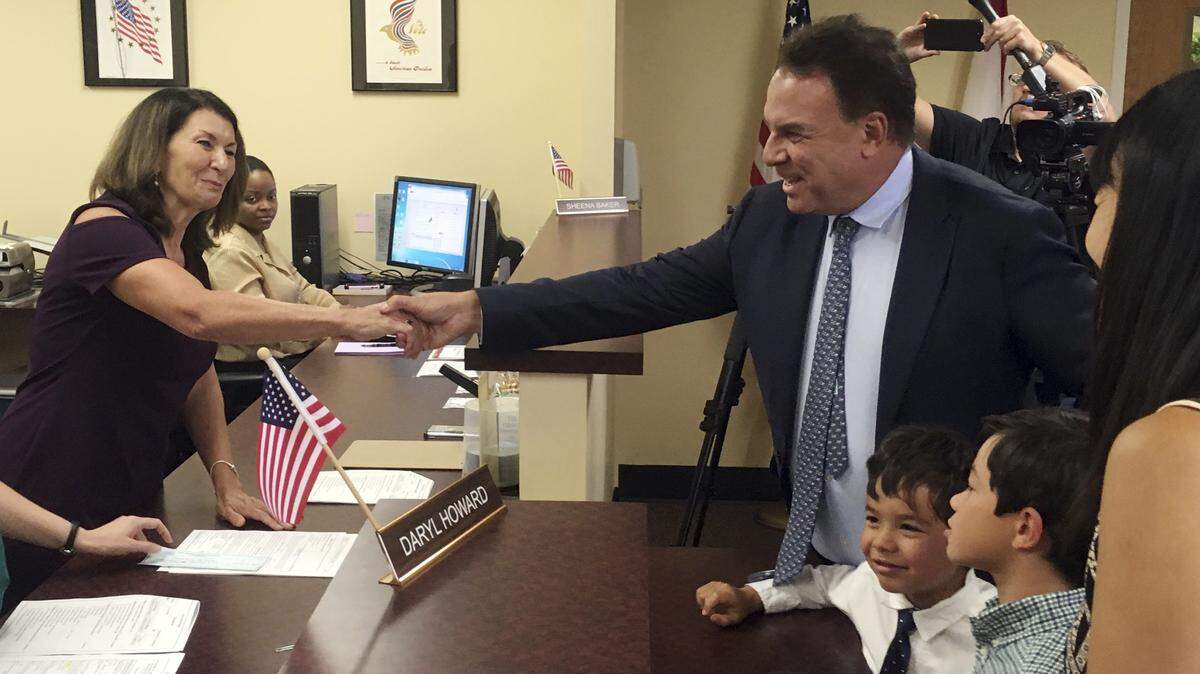 Billionaire Jeff Greene, accompanied by his wife, Mei Sze, and their three sons, Brandon, Malcolm and Cameran, turns in his qualifying papers to run for Florida governor as a Democrat on Wednesday, June 20, 2018, in Tallahassee. Greene said he would finance his own campaign and pledged that he would not take any outside donations over $100.  He has not had to file a campaign finance report yet.