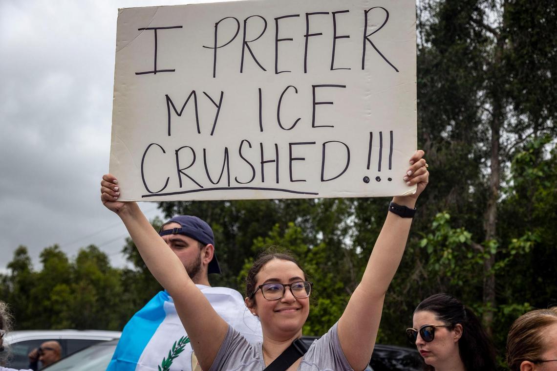 Stephanie, who resides in Miami, makes her feelings known along with hundreds of protesters who braved the rain to protest the conditions inside Krome Detention Center on Saturday, March 29.
