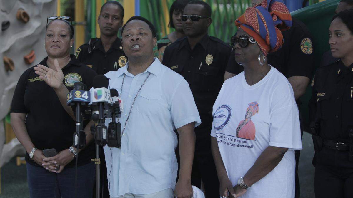 The Rev. Jerome Starling and officials from Miami and neighboring cities gathered in Legion Park for a press conference to discourage the use of firearms during the Fourth of July celebrations.