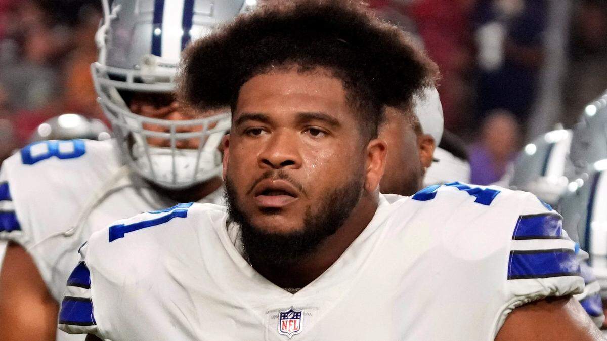 FILE - In this Aug. 13, 2021, file photo, Dallas Cowboys’ La’el Collins walks off the field during a preseason NFL football game against the Arizona Cardinals in Glendale, Ariz. The Dallas Cowboys are releasing right tackle La’el Collins in the second cost-cutting move involving one of their starters on offense, a person with knowledge of the decision said Thursday, March 17, 2022. (AP Photo/Rick Scuteri, File)