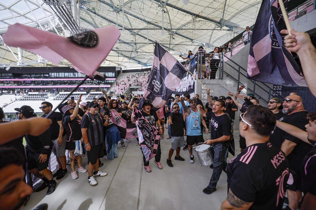 La Familia: Vice City 1896 performs as Inter Miami CF fans react inside the new 26,700-seat Nu Stadium at Miami Freedom Park on Thursday, April 2, 2026, in Miami.
