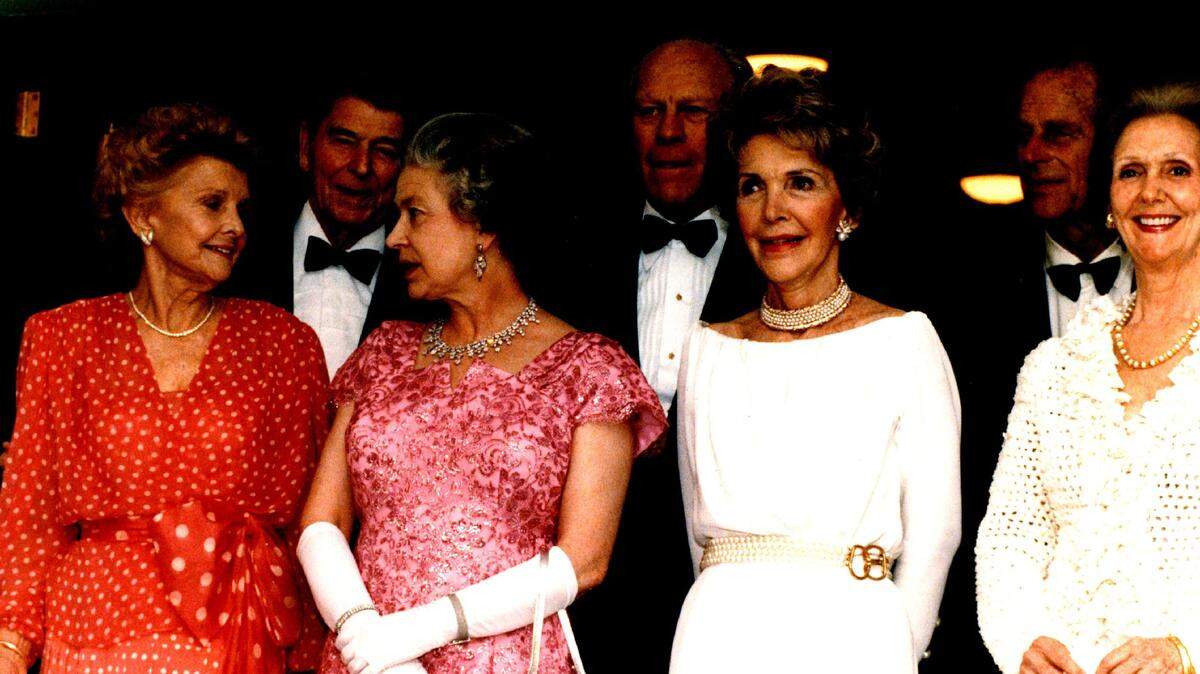 File photo from 1991, on the Britannia. From left to right: Betty Ford, former President Ronald Reagan, Queen Elizabeth, former President Gerald Ford, Nancy Reagan, Prince Philip and Rhea Chiles.