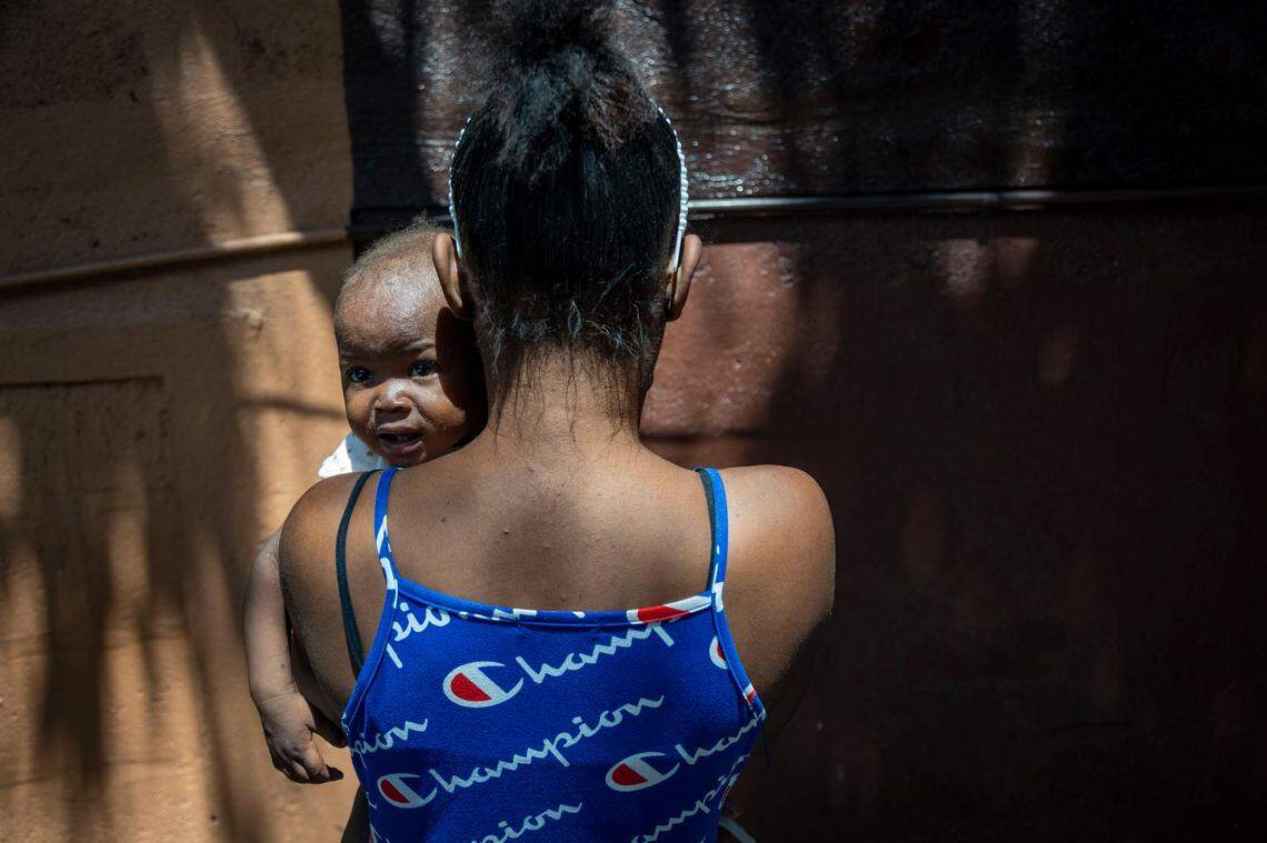 Guerda, 25, became pregnant with her rapist’s baby after she was gang-raped in November 2022 during an attack in Source-Matelas, a farming community north of Port-au-Prince, Haiti. She cares for the child by scrubbing pots on the streets of the capital.
