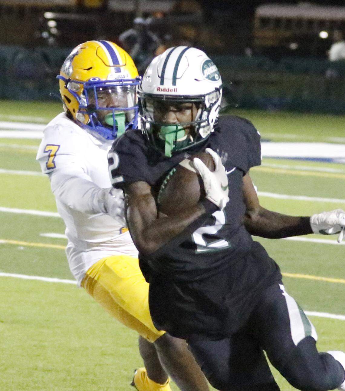 Miami Central Rockets wide receiverCorey Washington (2) carries the ball against Northwestern Bulls during Region 4-2M semifinal playoff football game on Friday, November 18, 2022 at Traz Powell Stadium in Miami. Andrew Uloza / for Miami Herald