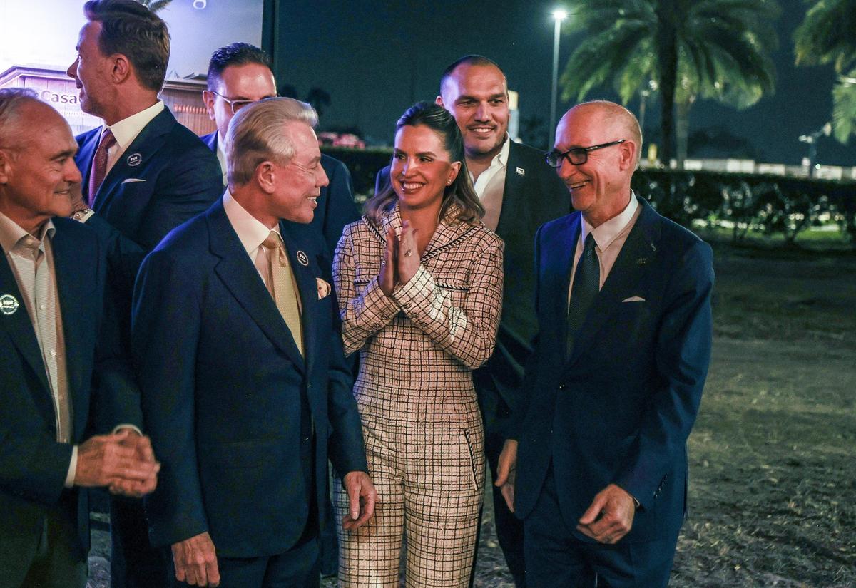 Florida International University President Dr. Kenneth A. Jessell (far right), with Benjamín León Jr., founder of Leon Medical Centers, and Mavileibys Campa, center, at the unveiling of architectural renderings for CasaCuba, an academic and cultural center showcasing Cuban and Cuban-American heritage on Jan. 28, 2025. The building will be located at FIU’s main campus.