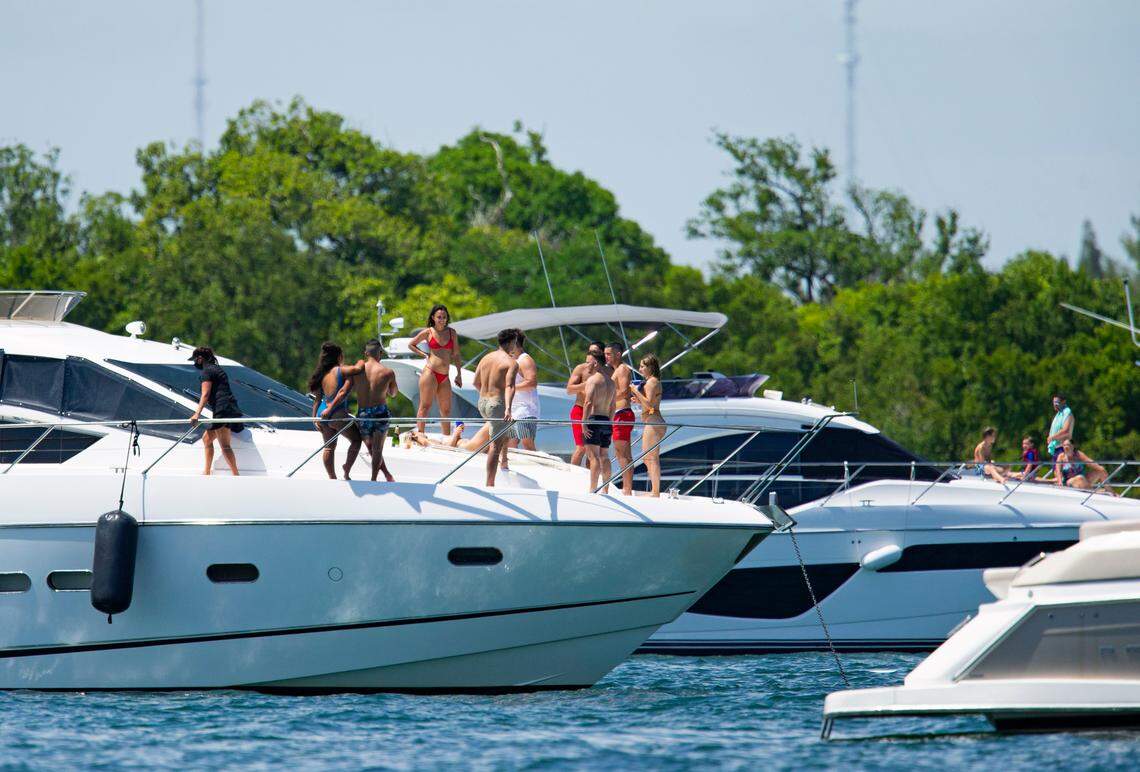 Boaters gather at the Haulover Sandbar during the ongoing pandemic on Sunday, September 6, 2020, in Miami Beach.