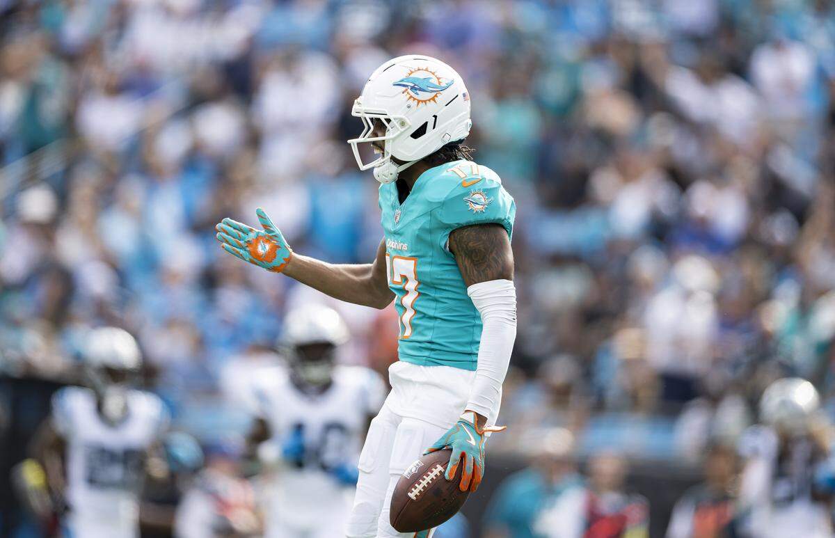 Miami Dolphins wide receiver Jaylen Waddle (17) reacts after scoring a touchdown against the Carolina Panthers in the second half of their NFL game at the Bank of America Stadium on Sunday, Oct. 5, 2025, in Charlotte, N.C.
