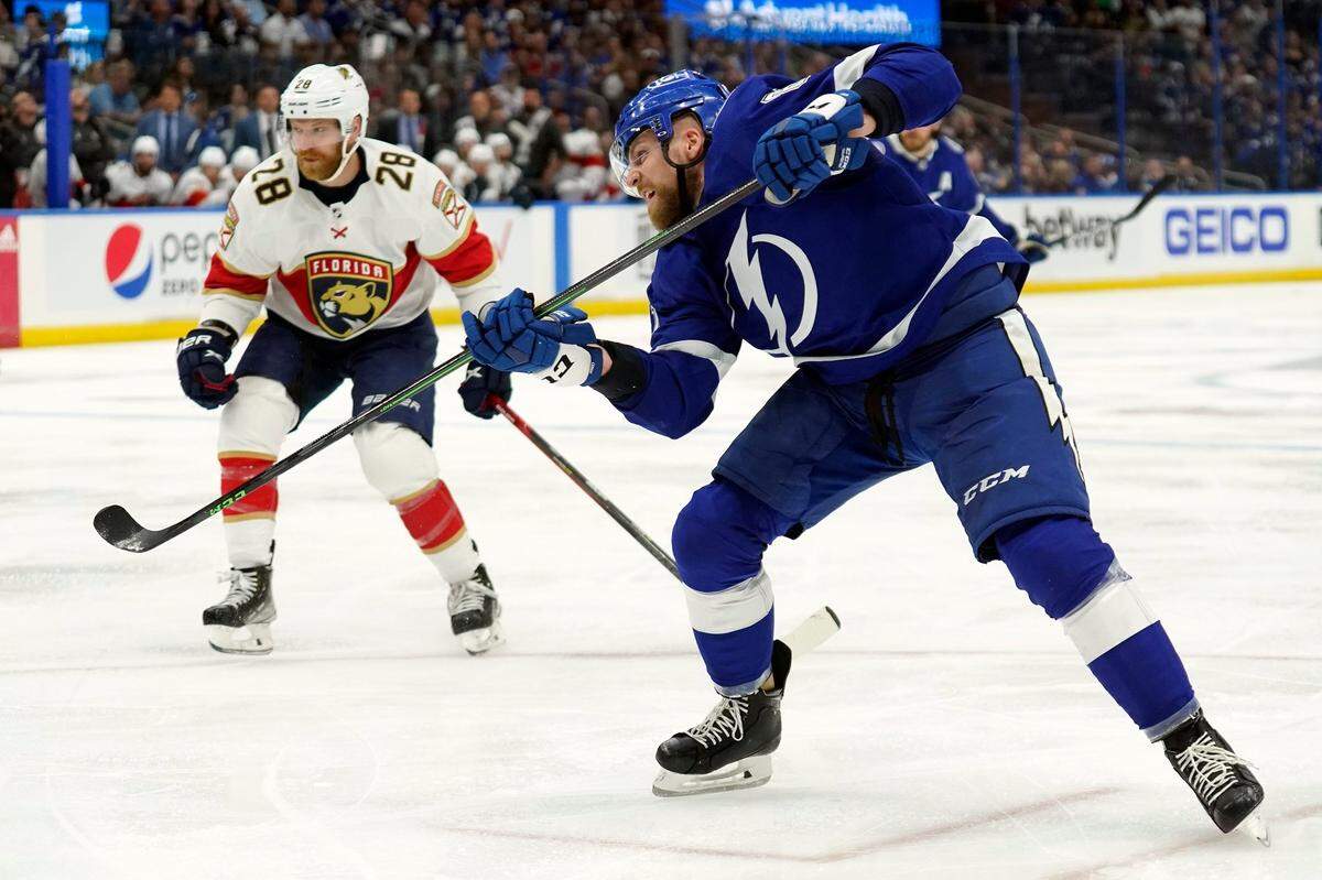 Tampa Bay Lightning defenseman Erik Cernak (81) watches his shot get past Florida Panthers goaltender Sergei Bobrovsky for a goal during the second period in Game 3 of an NHL hockey second-round playoff series Sunday, May 22, 2022, in Tampa, Fla. Looking on is Panthers’ Claude Giroux (28). (AP Photo/Chris O’Meara)