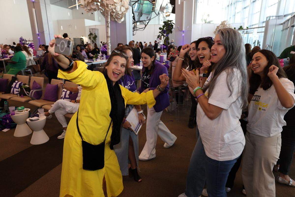 Community supporters celebrate on Give Miami Day 2024 at the Royal Caribbean terminal at PortMiami.